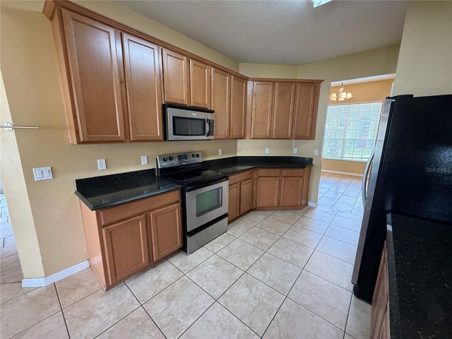7101 WHITE TRILLIUM CIRCLE, Orlando, FL 32818