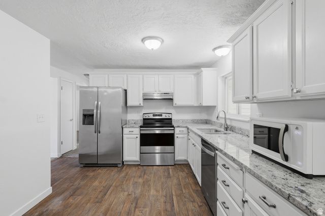 2395 W LONGMEADOW DR, Taylorsville, UT 84129