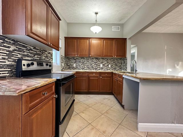 4121 Colt Lane, West Palm Beach, FL 33406