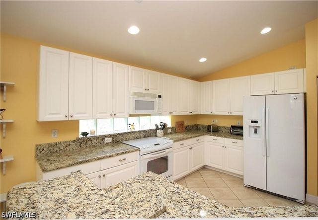 2322 Butterfly Palm DR, Naples, FL 34119