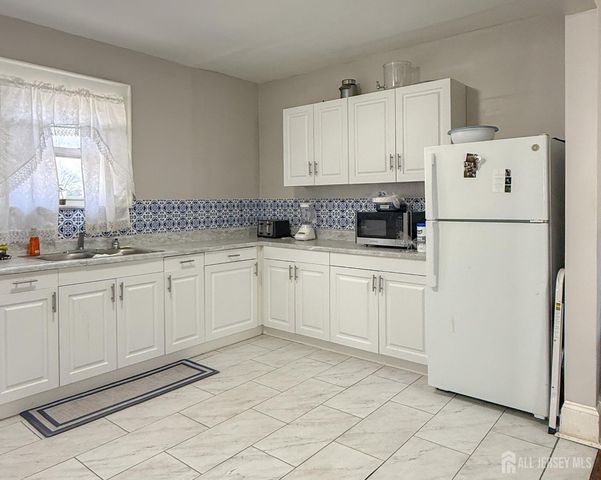 130 Elmwood Avenue, East Orange, NJ 07018