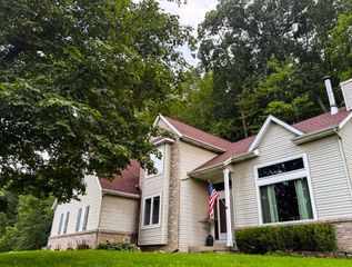 8824 Grand River Drive, Ada, MI 49301
