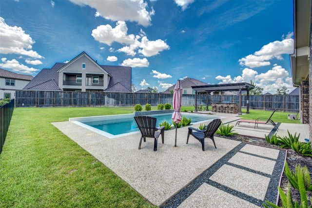 25710 Oakwood Knoll Drive, Katy, TX 77494