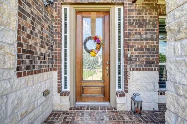 25710 Oakwood Knoll Drive, Katy, TX 77494