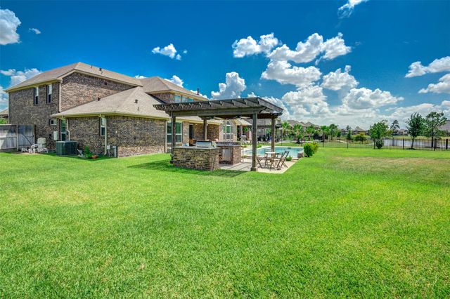 25710 Oakwood Knoll Drive, Katy, TX 77494