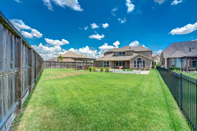 25710 Oakwood Knoll Drive, Katy, TX 77494