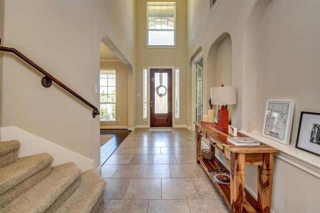 25710 Oakwood Knoll Drive, Katy, TX 77494