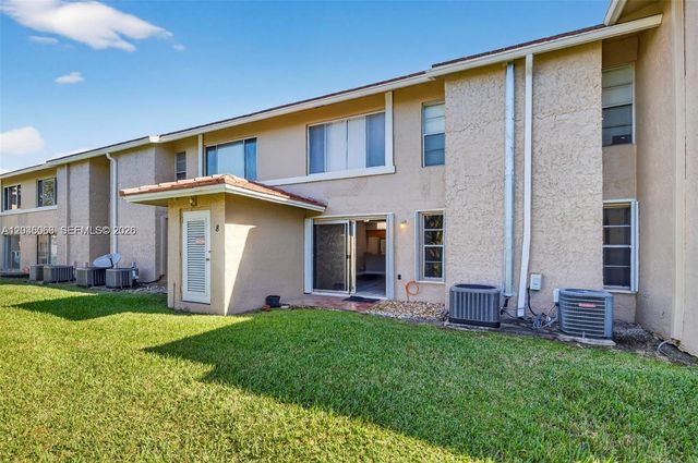 908 Twin Lakes Drive 8C, Coral Springs, FL 33071