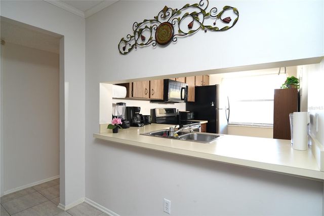 3276 CANDLE RIDGE COURT 202, Orlando, FL 32822