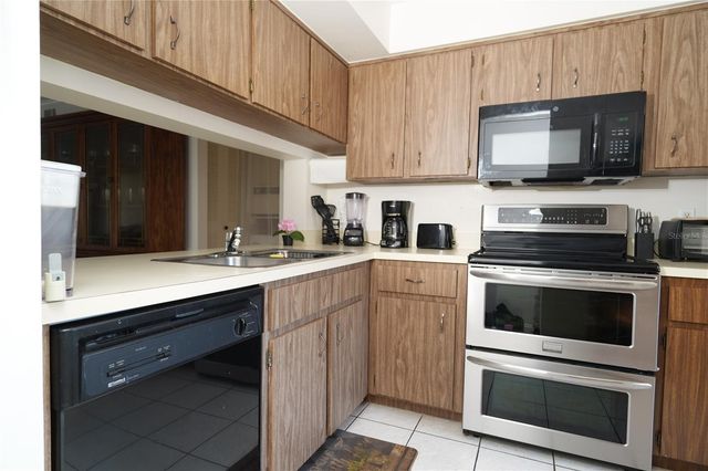 3276 CANDLE RIDGE COURT 202, Orlando, FL 32822