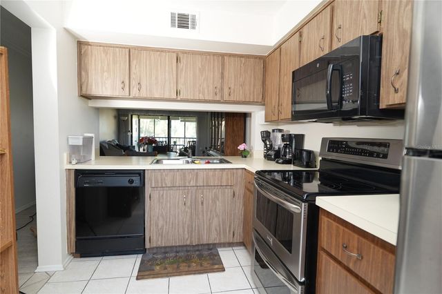 3276 CANDLE RIDGE COURT 202, Orlando, FL 32822