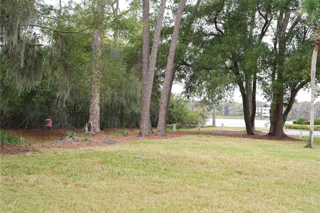 3276 CANDLE RIDGE COURT 202, Orlando, FL 32822