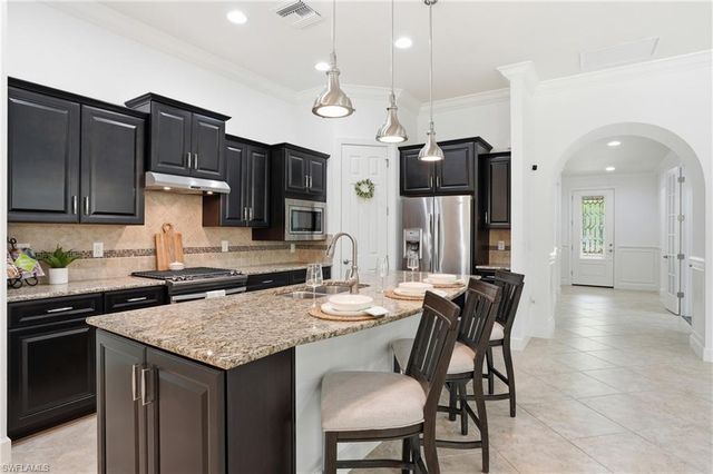 9436 Whooping Crane WAY, Naples, FL 34120