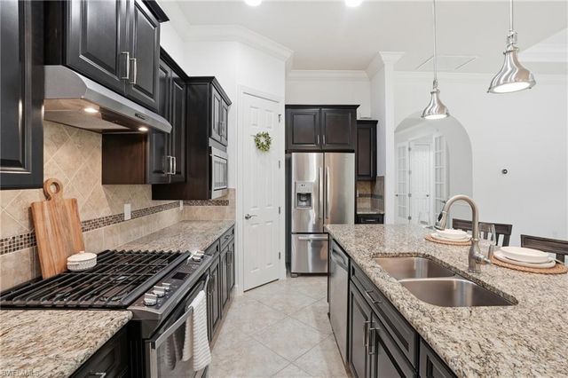 9436 Whooping Crane WAY, Naples, FL 34120