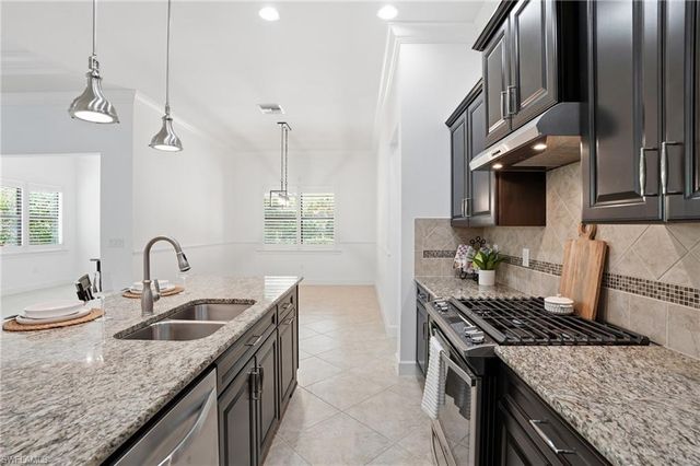 9436 Whooping Crane WAY, Naples, FL 34120