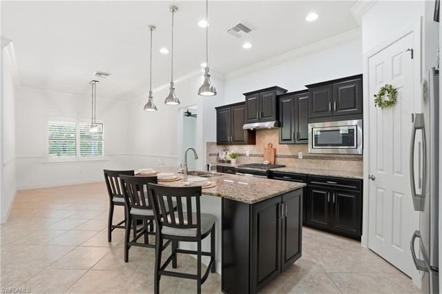 9436 Whooping Crane WAY, Naples, FL 34120