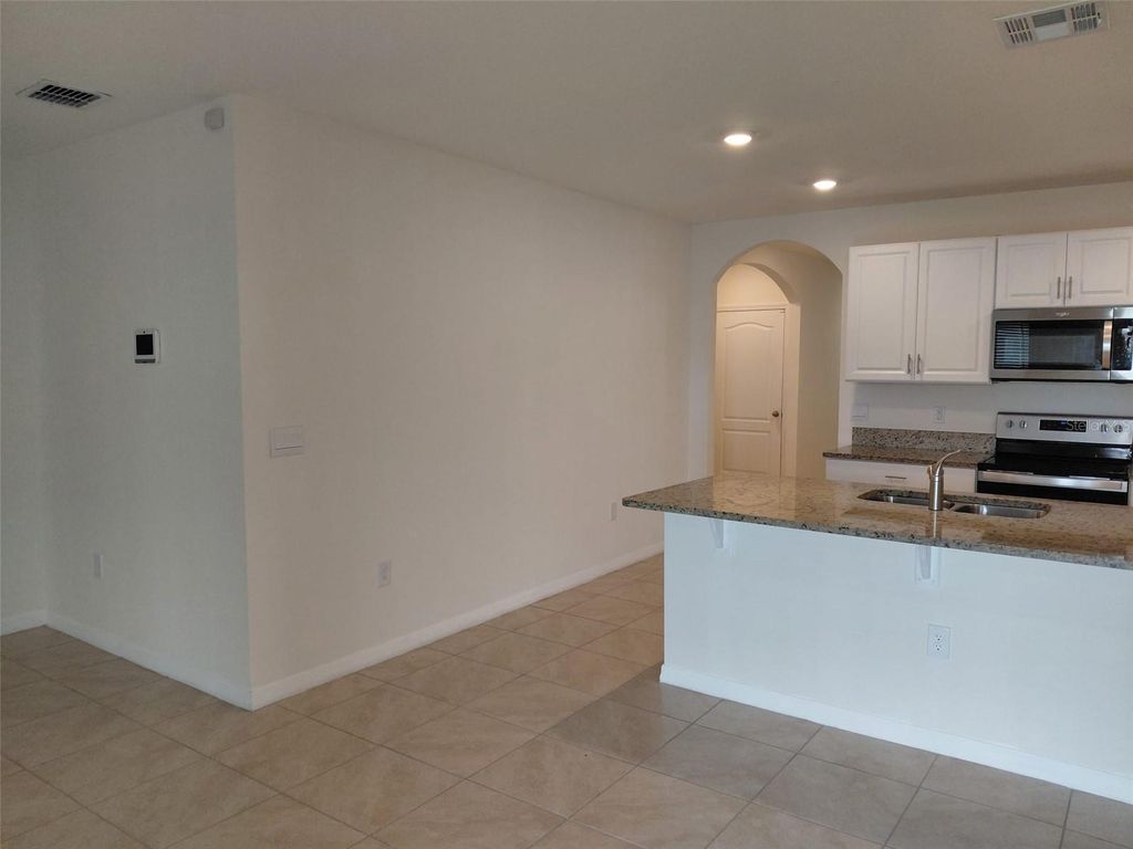 Image 4 of property listing at 1842 EGRET MEADOWS AVENUE, Kissimmee, FL 34744