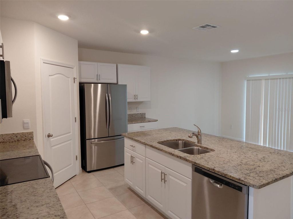 Image 9 of property listing at 1842 EGRET MEADOWS AVENUE, Kissimmee, FL 34744