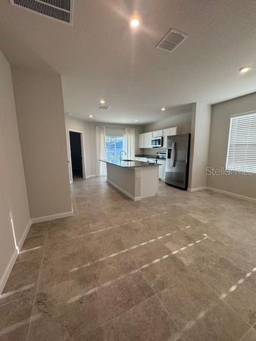 1210 PORT BLUE WAY, Lady Lake, FL 32159