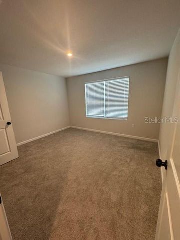 1210 PORT BLUE WAY, Lady Lake, FL 32159