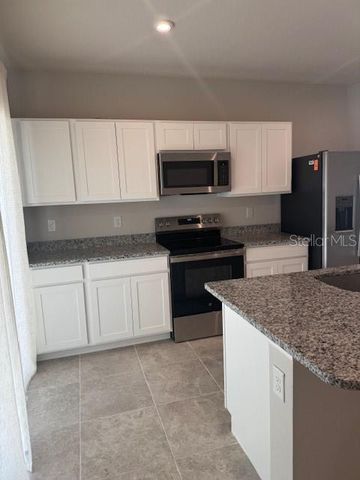 1210 PORT BLUE WAY, Lady Lake, FL 32159