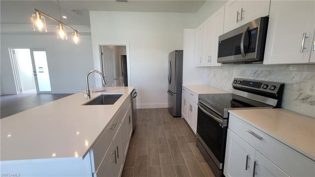 424 SW 28th AVE, Cape Coral, FL 33991