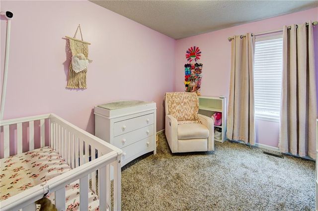 428 Madison Creek Drive, Raymore, MO 64083