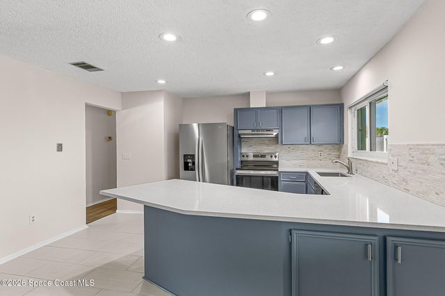 1091 Cadillac Drive NE, Palm Bay, FL 32905