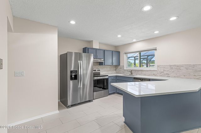 1091 Cadillac Drive NE, Palm Bay, FL 32905
