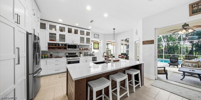 6191 Ashwood LN, Naples, FL 34110