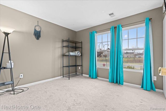 8564 Fox River Drive, Fowlerville Village, MI 48836