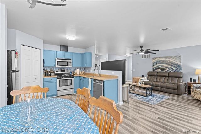 8564 Fox River Drive, Fowlerville Village, MI 48836