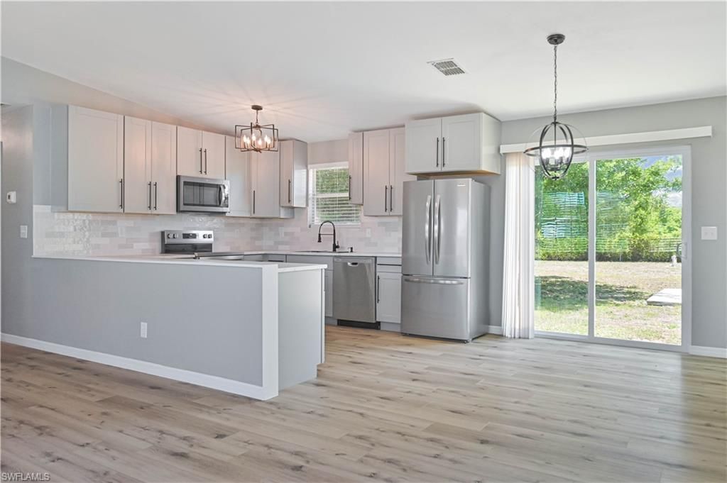 3313 14th ST SW, LEHIGH ACRES, FL 33976 — photo 2