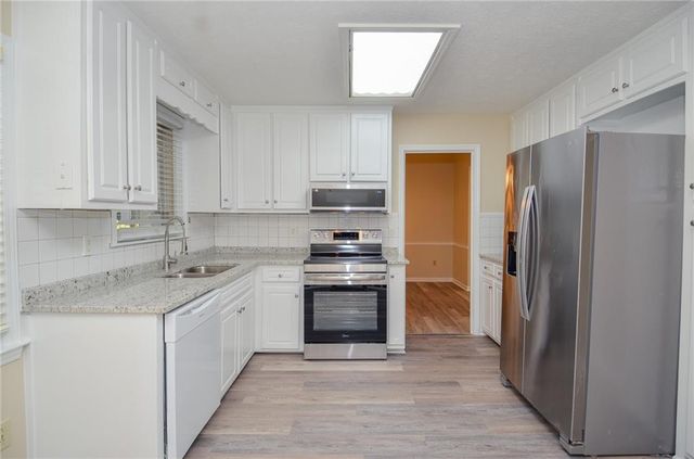 3173 Falconhurst SW Drive, Lilburn, GA 30047