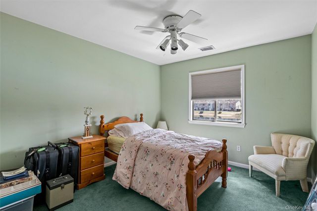 157 Hidden Ponds Circle, Smithtown, NY 11787