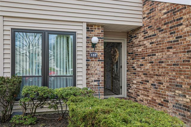 157 Hidden Ponds Circle, Smithtown, NY 11787