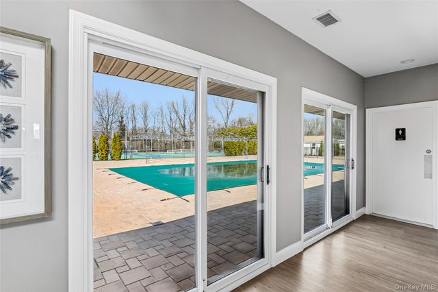 157 Hidden Ponds Circle, Smithtown, NY 11787