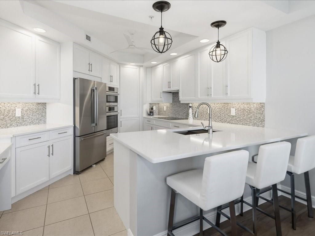 445 Cove Tower DR 704, NAPLES, FL 34110 — photo 2