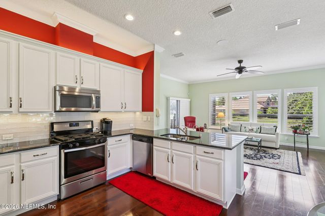 7786 BLACKSTONE RIVER Drive E, Jacksonville, FL 32256