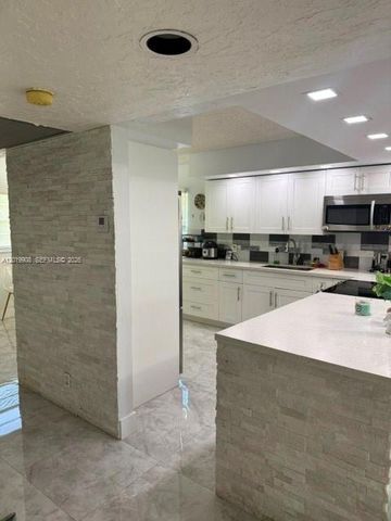 12850 SW 4th Ct 201I, Pembroke Pines, FL 33027