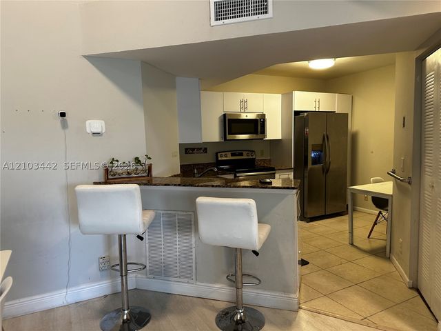8721 Wiles Rd 303, Coral Springs, FL 33067