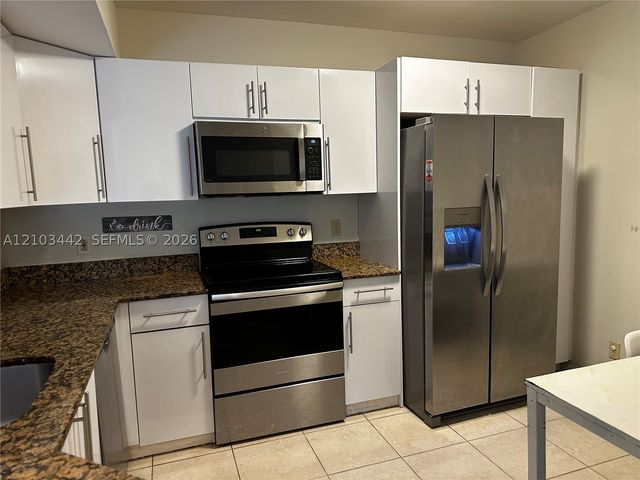 8721 Wiles Rd 303, Coral Springs, FL 33067