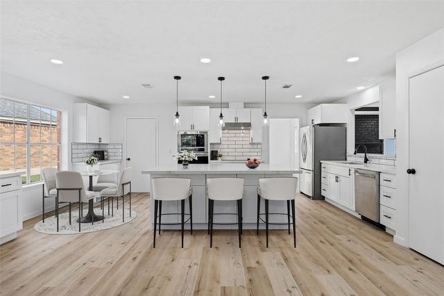 8014 17th Green Drive, Humble, TX 77346