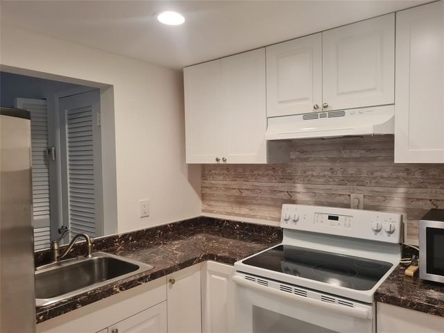 300 Golden Isles Drive 104, Hallandale Beach, FL 33009