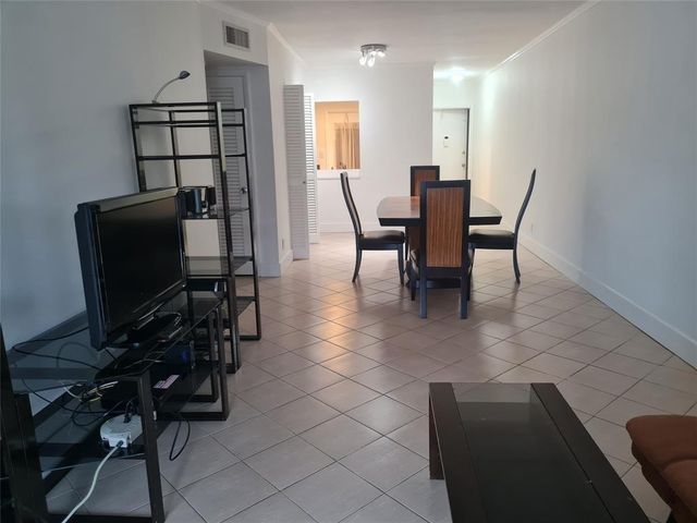 300 Golden Isles Drive 104, Hallandale Beach, FL 33009