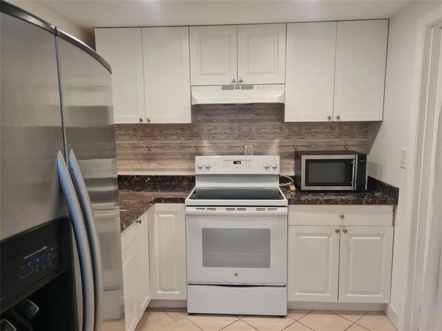 300 Golden Isles Drive 104, Hallandale Beach, FL 33009