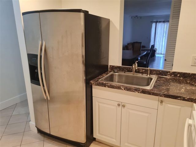 300 Golden Isles Drive 104, Hallandale Beach, FL 33009