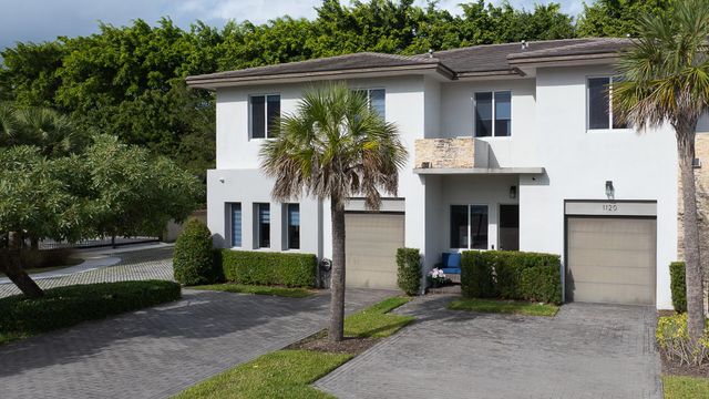 1120 Pioneer Way, Royal Palm Beach, FL 33411