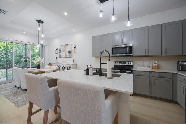 1120 Pioneer Way, Royal Palm Beach, FL 33411