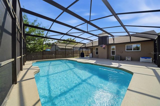 7632 LAKESIDE WOODS DRIVE, Orlando, FL 32810